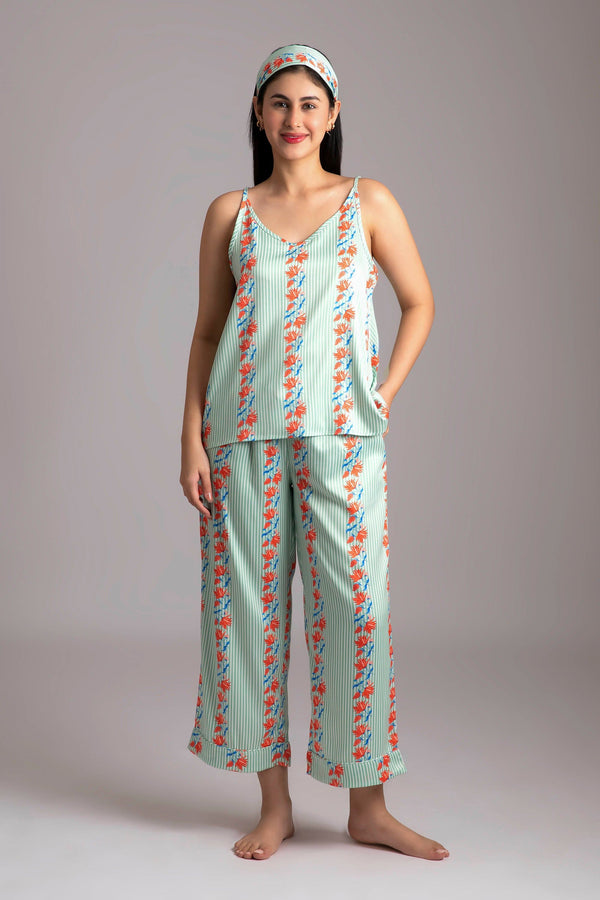 Timsi-Sparkling  Fabric-Poly satin  Style-Cheerful  Our playful night suit set is made and trimmed from smooth man made fibre and is perfect  to lounge in. It has a playful yet curious  camisole and coordinated easy culottes  with an elasticated waist band for that extra comfort. 