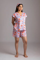 Rina-Beloved  Fabric-Cotton satin  Style-Chic  Our short  sleeved night suit set is made and trimmed from serene cotton and is perfect to lounge in. It has a relaxed silhouette top and coordinated elegant shorts  with an elasticated waistband with a drawstring adding meaning to comfort and relaxation. 