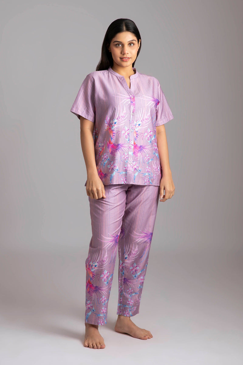 Shia-Gift from god  Fabric-Cotton satin   Style-Classic  Our half sleeve night suit with a notched round neck is made from serene cotton and is coordinated with  smart pants that have an elasticated waistband with a drawstring for added comfort. 