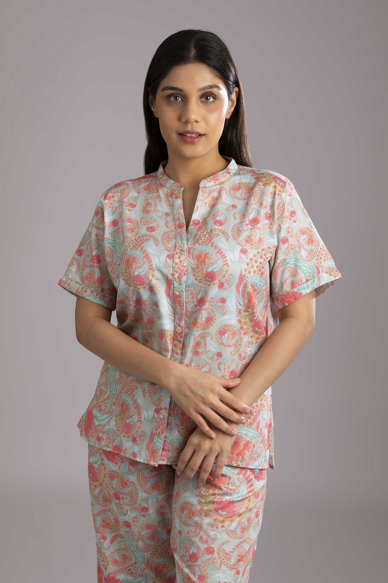 Naina-Eyes  Fabric-Cotton satin  Style- Modish  Our half sleeve night suit with a notched round neck is made from serene cotton which has an unbelievably soft hand feel and is  coordinated with easy culottes with an elasticated waist band for that extra comfort. 