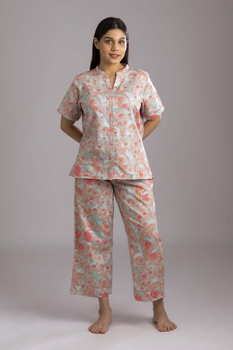 Naina-Eyes  Fabric-Cotton satin  Style- Modish  Our half sleeve night suit with a notched round neck is made from serene cotton which has an unbelievably soft hand feel and is  coordinated with easy culottes with an elasticated waist band for that extra comfort. 