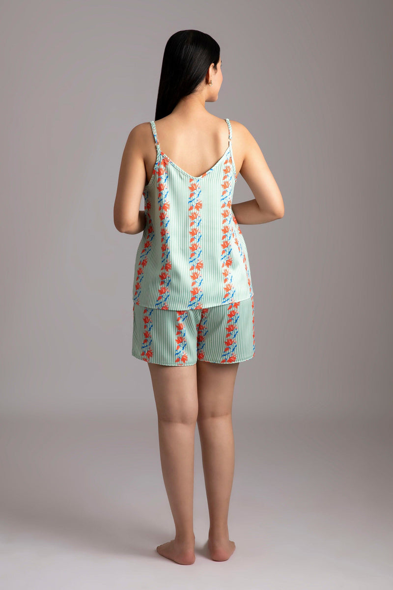 Timsi-Sparkling  Fabric-Poly satin  Style-Playful   This playsuit is perfect for a balmy evening - a cheerful yet curious camisole coordinated with elegant shorts adds meaning to comfort and relaxation. 