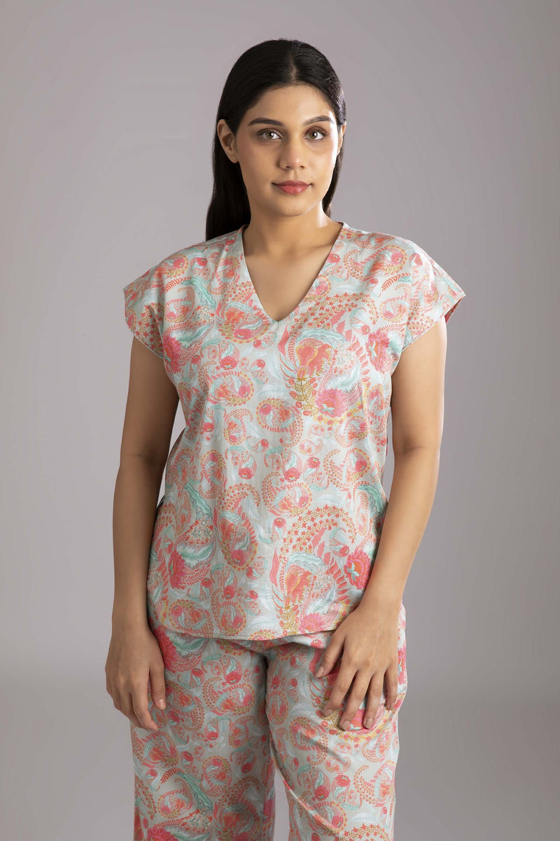 Naina-Eyes  Fabric-Cotton satin  Style-Ritzy   Our short sleeved night suit is made and trimmed from serene cotton and is perfect to lounge in. It has a relaxed silhouette top and coordinated easy culottes with an elasticated waist band for that extra comfort. 