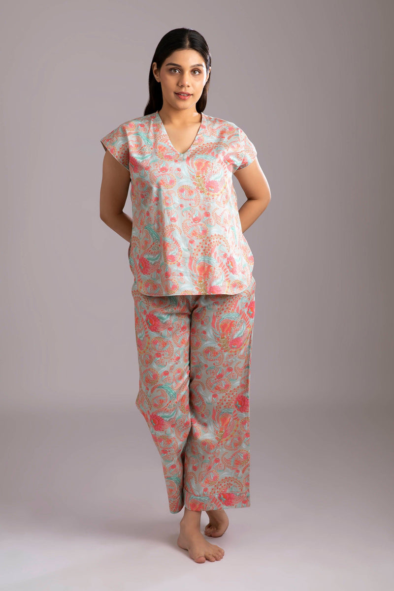 Naina-Eyes  Fabric-Cotton satin  Style-Ritzy   Our short sleeved night suit is made and trimmed from serene cotton and is perfect to lounge in. It has a relaxed silhouette top and coordinated easy culottes with an elasticated waist band for that extra comfort. 