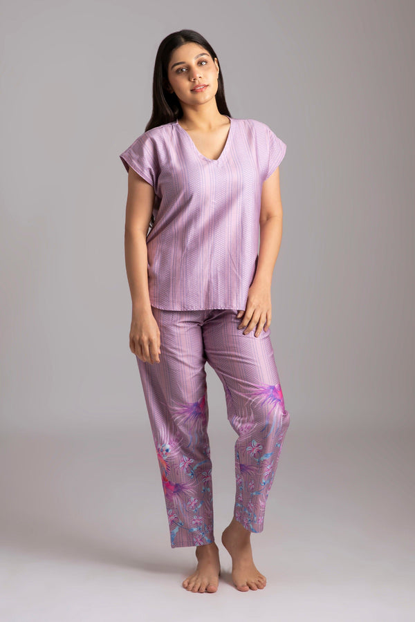 Shia-Gift from god  Fabric-Cotton satin  Style-Voguish  Our short sleeved night suit is made and trimmed from high quality breathable cotton  and is perfect to lounge in. It has a relaxed silhouette top and coordinated smart pants have an elasticated waistband with a drawstring for added comfort. 