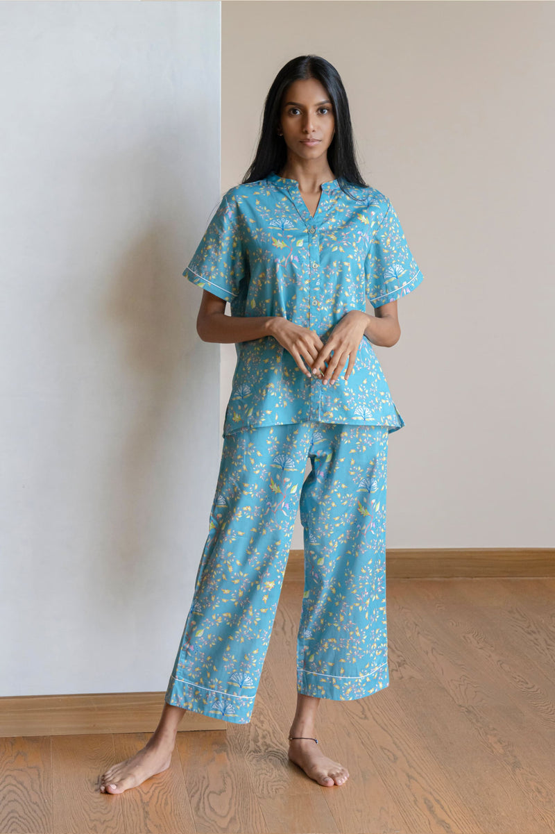 Our half sleeve night suit with a notched round neck is made from serene cotton which has an unbelievably soft hand feel and is  coordinated with easy culottes with an elasticated waist band for that extra comfort. 