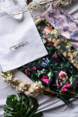 Three pairs of pants in luxurious poly satin  in vibrant prints, perfect to lounge in. Comfortable culottes and elegant straight fit pants, with an elasticated waistband with a drawstring adding meaning to comfort and relaxation.