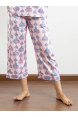 Three pairs of pants in luxurious poly satin  in vibrant prints, perfect to lounge in. Comfortable culottes and elegant straight fit pants, with an elasticated waistband with a drawstring adding meaning to comfort and relaxation.