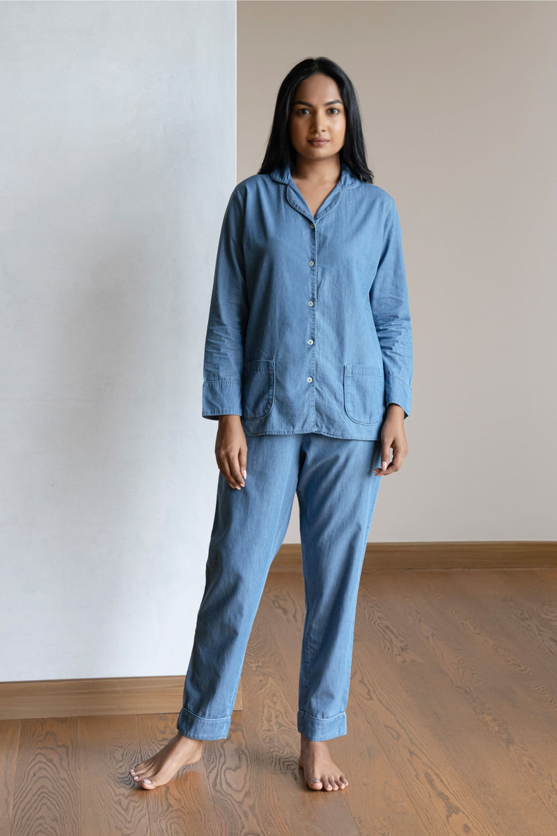 This Timeless style has a shirt with a relaxed fit, curved lapels, elegant pockets, beautiful piping to compliment the print, while the coordinated smart pants have an elasticated waistband with a drawstring for added comfort. Our long sleeved luxurious night suit is made from lightweight cotton denim, which is a breathable soft fabric.